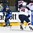 GRAND FORKS, NORTH DAKOTA - APRIL 23: Finland's Eeli Tolvanen #20 plays the puck while USA's Ryan Lindgren #18 defends during semifinal round action at the 2016 IIHF Ice Hockey U18 World Championship. (Photo by Matt Zambonin/HHOF-IIHF Images)

